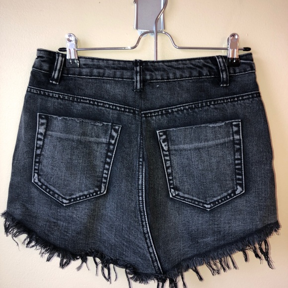 Mini black denim skirt - Picture 2 of 2